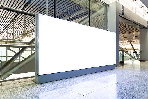 Blank billboard on the railroad station.