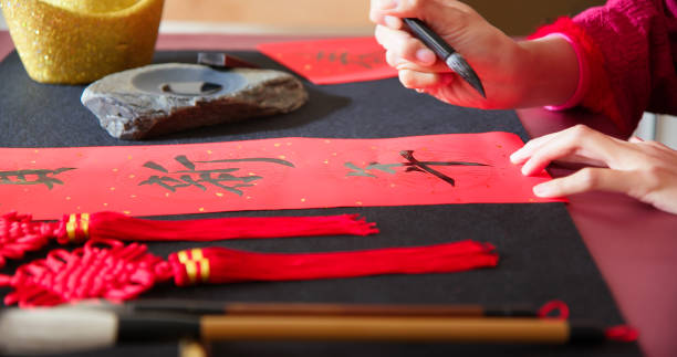 istock Writing spring festival couplets 1365279738