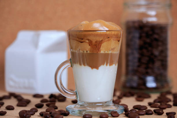 istock dalgona coffee in transparent cup and fresh croissant 1365279842