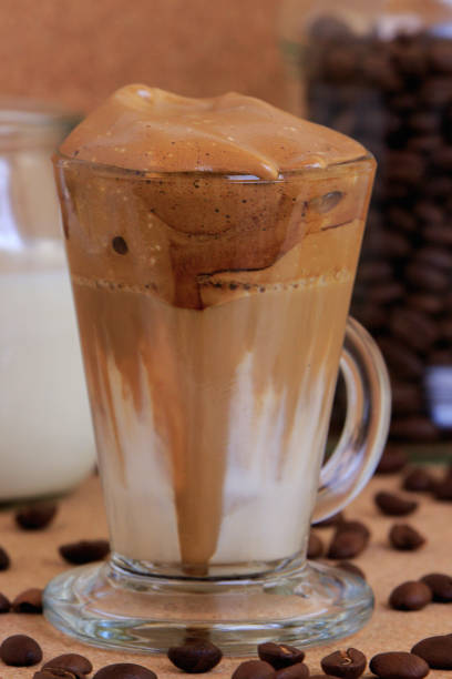 istock dalgona coffee in transparent cup and fresh croissant 1365280558