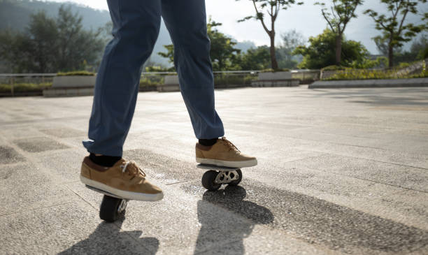 istock Freeline skateboarder legs skateboarding at city 1365285997