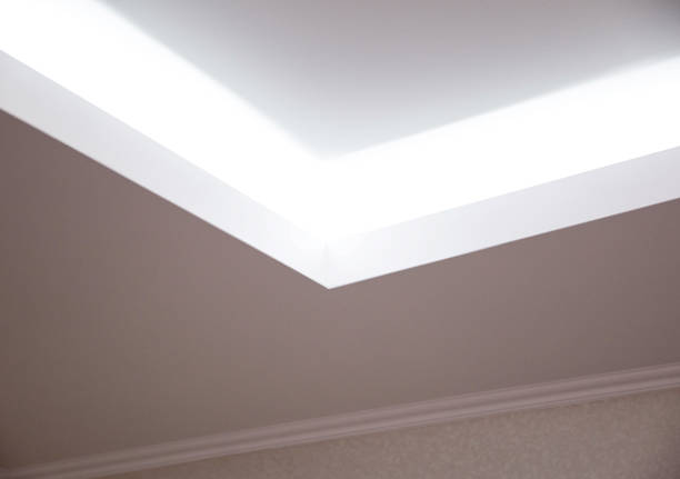 istock Parts of a designer stretch ceiling with diode lighting. Modern ceiling renovation, interior 1365290817
