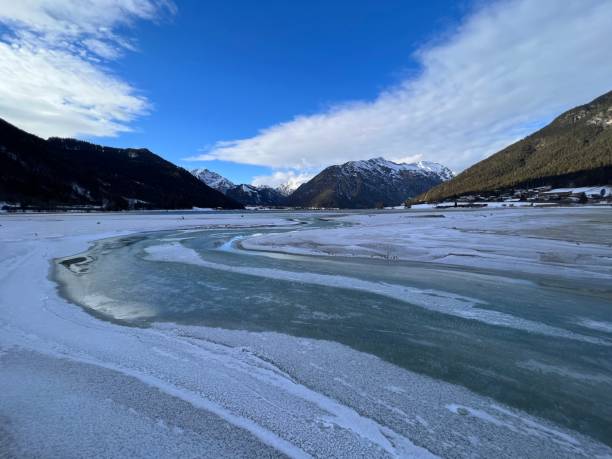 istock Achensee between Maurach and Pertisau Karwendel in the schwaz district Tyrol Austria - Eis Eisecke Ice layer 1365291075