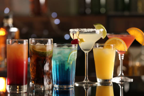 istock Different delicious cocktails on counter in bar 1365292197