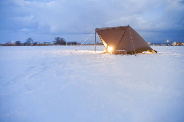 a tent on snow field in suburbs