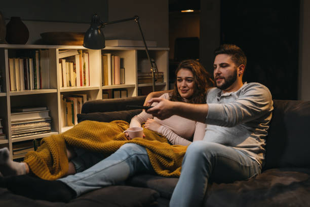 istock friends enjoying time together at home 1365294952