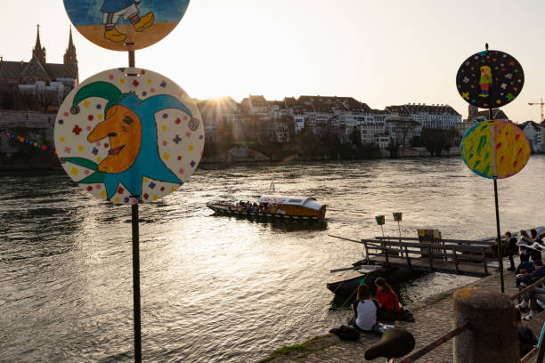 Basel, Switzerland - February 21. Ferry crossing the rhine river with carnival decorations