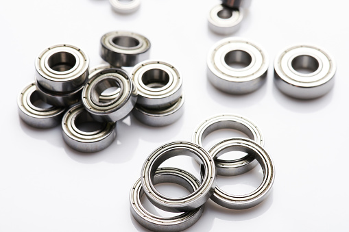 Metal precise bearings set isolated on studio background