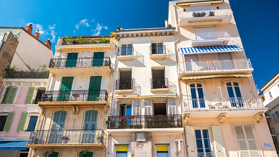 Residential buildings made in traditional style in Cannes, France