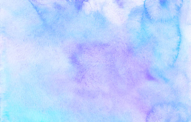 istock Watercolor pastel blue and purple background texture. Light cerulean and violet stains on paper, hand painted. 1365297601