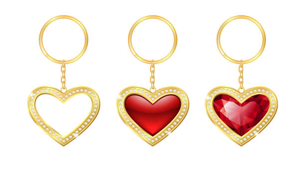 Set of Realistic keychains red heart shape Set of Realistic keychains red heart shape, holder trinket for key with golden ring. 3d template fob, accessory or souvenir trinket for home, car or office. Vector illustration keyring charm stock illustrations