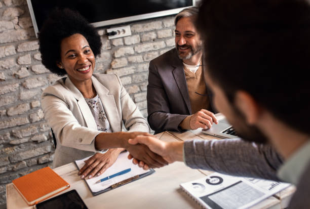 istock Business recruiters talking with candidate during job interview. 1365304129