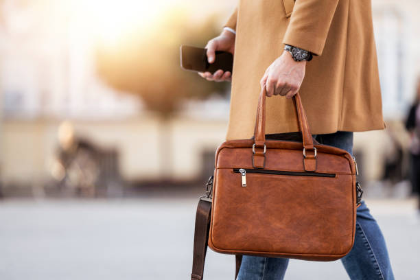 istock Businessman with briefcase outdoor 1365304189