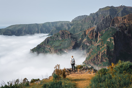 Young woman enjoying the great outdoors on Madeira island. Image was taken on the way up to the Pico Ruivo, the highest mountain on the island.