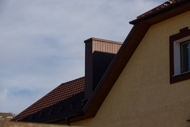 istock New roofing construction with attic skylights, rain gutter system, roof windows and roof protection from snow board, snow guard exterior 1365305455