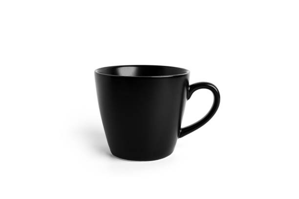istock Black tea cup for drink isolated on white background. Ceramic coffee cup or mug close up 1365305520