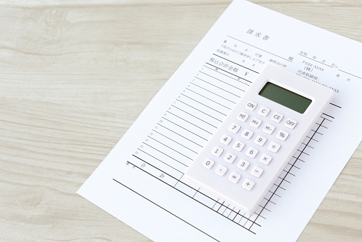 Japanese invoice document and calculator