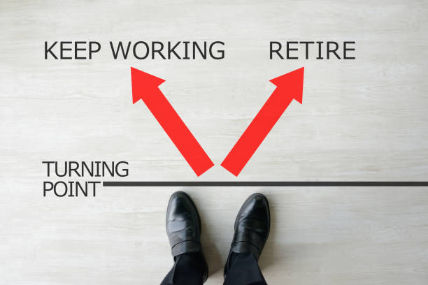 istock Business man choosing keep working or retire 1365307417