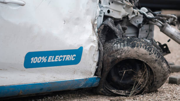 istock Crashed electric car in severe accident, frontal impact 1365311058