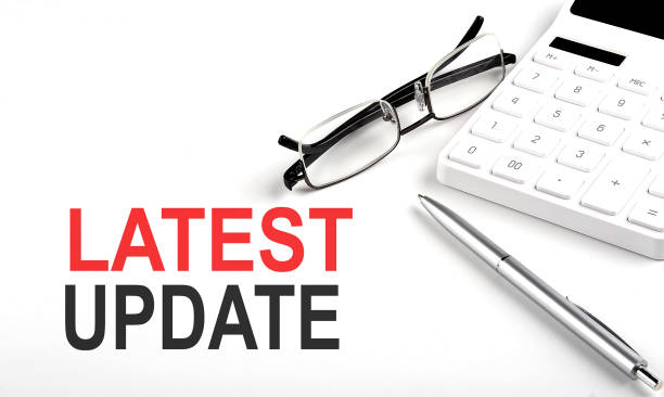 LATEST UPDATE Concept. Calculator,pen and glasses on white background