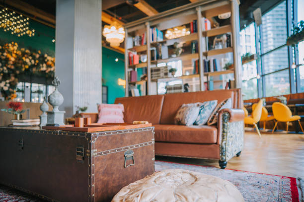 luxury classic interior lounge lobby reception with leather sofa book shelf living room