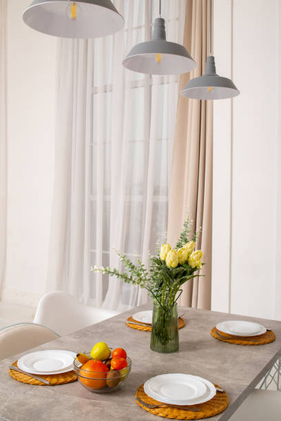 istock Kitchen table with dishes and fruits.