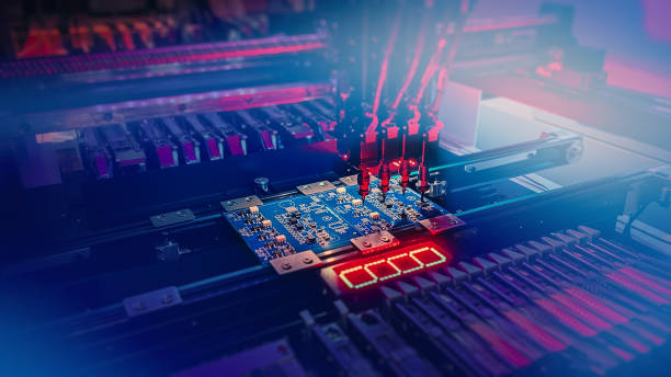 istock Electronic production of computer chips by SMT Pick and Place machine with Machine Vision System 1365314923