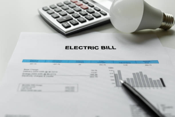 electric bill charges paper - rekening stockfoto's en -beelden