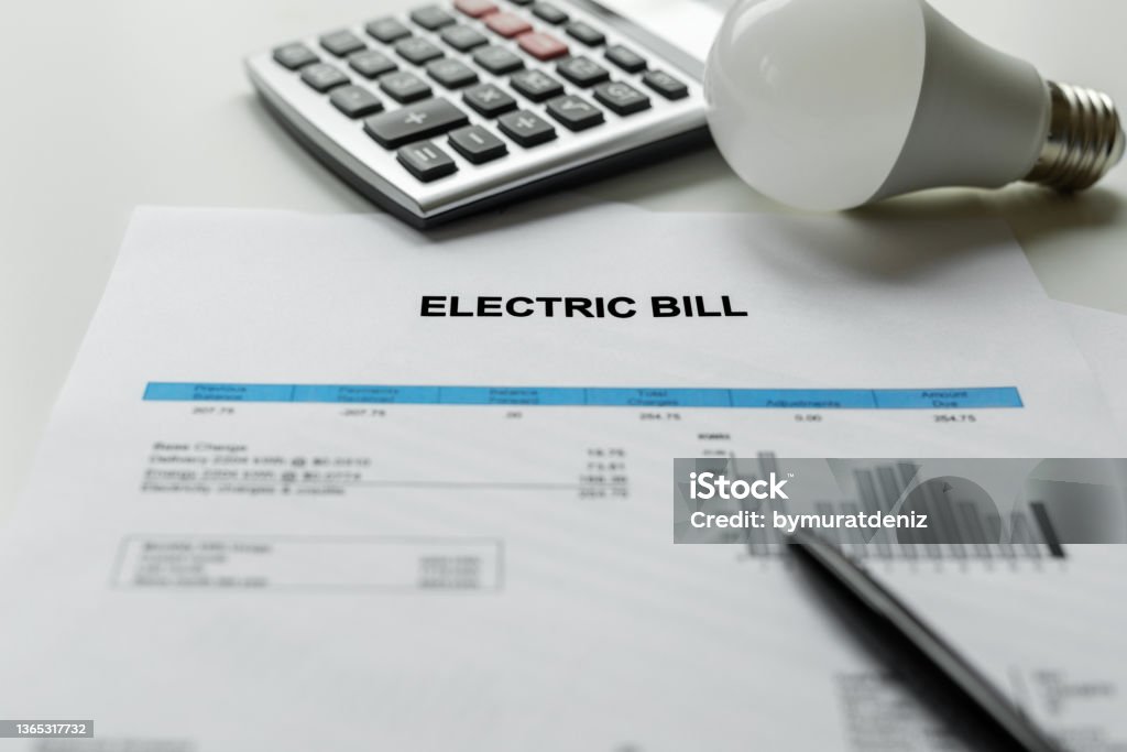 Electric bill charges paper Financial Bill Stock Photo