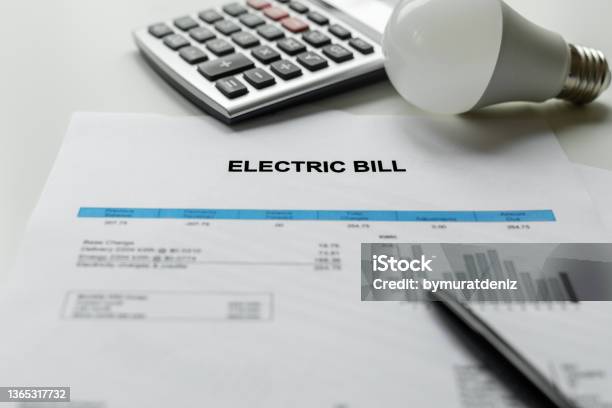 Electric Bill Charges Paper Stock Photo - Download Image Now - Financial Bill, Electricity, Bill - Legislation