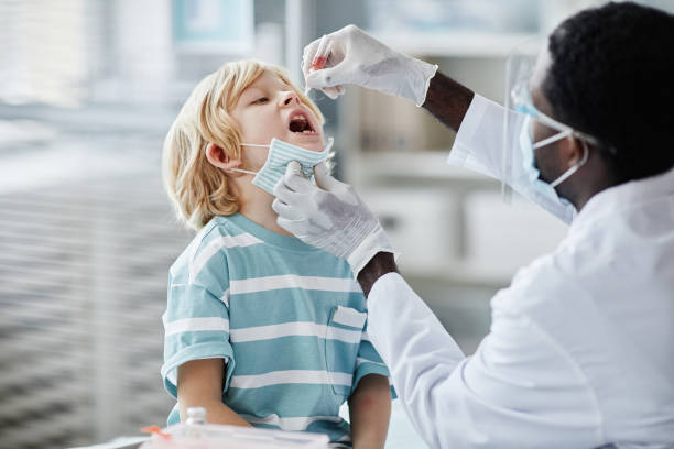 istock Oral Vaccine for Little Boy 1365322512