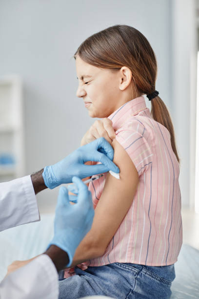 istock Brave Girl Getting Vaccinated 1365322572