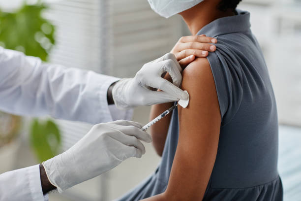 istock African American Girl Getting Vaccine Close Up 1365322607