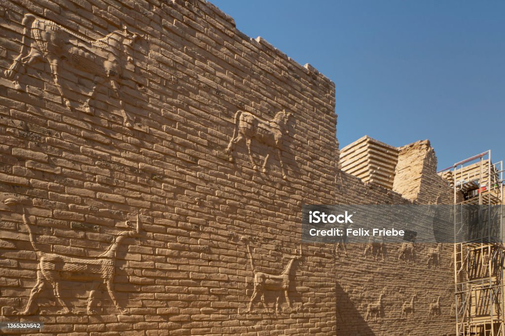 Reliefs at walls in the ancient city of Babylon, Iraq Ancient Stock Photo