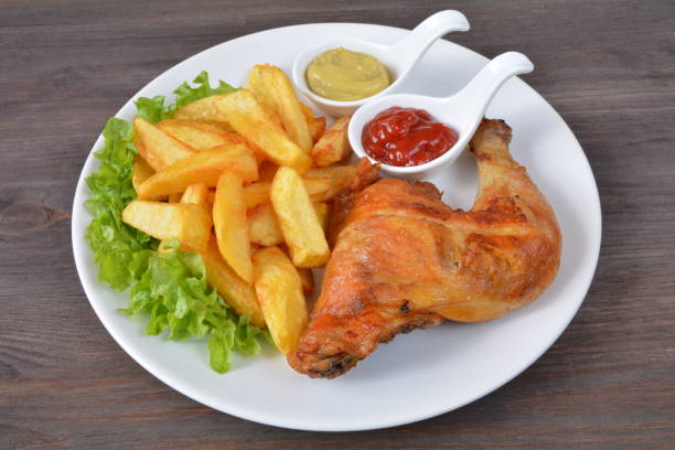 chicken leg with fries, ketchup, and mustard