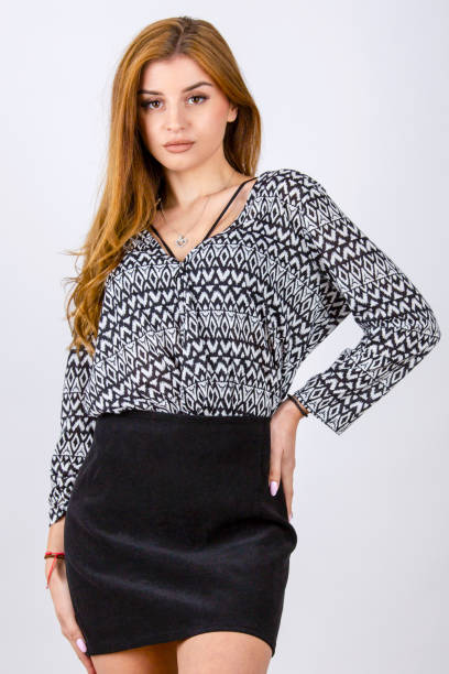 istock model posing in the studio with black suede skirt close up 1365328238