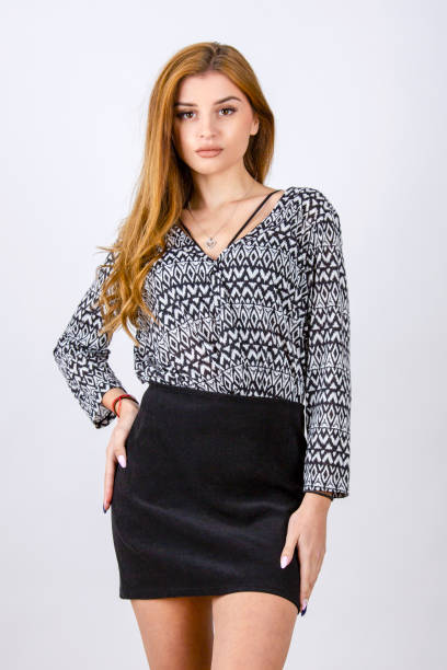istock model posing in the studio with black suede skirt close up 1365328252