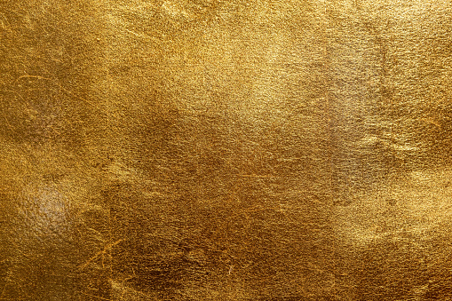 Texture of golden leaf foil closeup