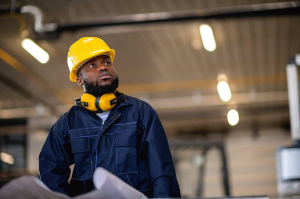 Man working in the factory stock photo