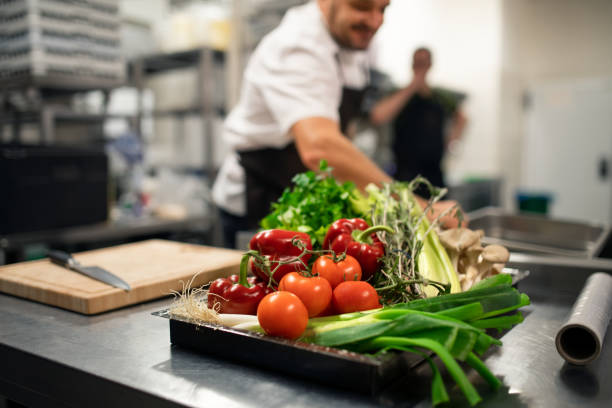 istock Fresh ripe vegetables prepared for cutting in commercial kitchen. 1365331426