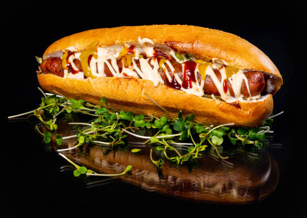 istock Hot dog with sauce.