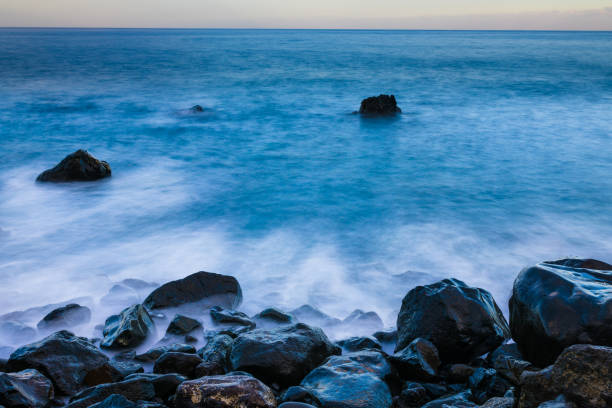istock Porto Moniz, Madeira sea scape with waves 1365343046