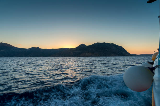 istock Boat wake, leaving the island 1365351186