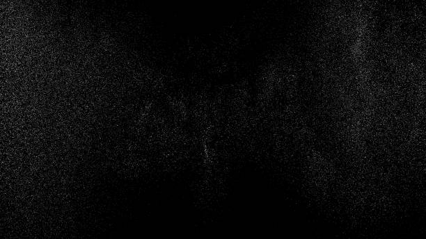 Distressed white grainy texture. Distressed white grainy texture. Dust overlay textured. Grain noise particles. Snow effects pack. Rusted black background. Vector illustration, EPS 10. black textured background stock illustrations