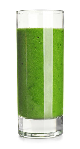 istock Fresh green juice in glass isolated on white 1365352624