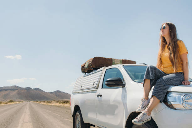 istock Female traveler exploring Namibia by camera truck 1365352996