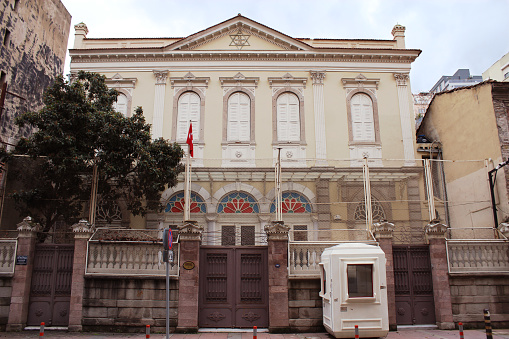 Izmir, Turkey - December 11, 2021 : Bet Israel Synagogue front facade view from Mithatpaşa street,  Konak district.  Built in 1907, it is the largest synagogue of the city.