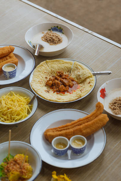 istock Pork curry with roti and breakfast set 1365358479