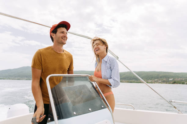 istock Couple taking a boat ride on the sea 1365362124
