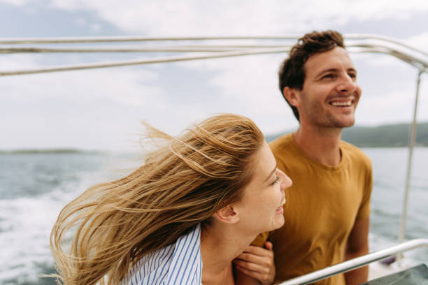istock Couple taking a boat ride on the sea 1365362144
